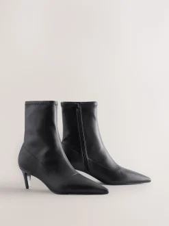Black Forever Comfort® Pointed Toe Sock Boots