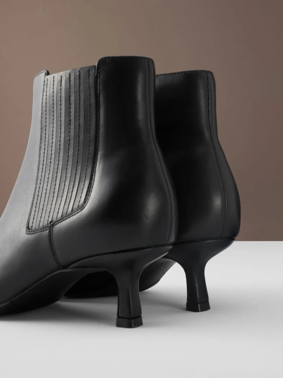 Black Leather Motion Flex Almond Toe Chelsea Style Ankle Boots