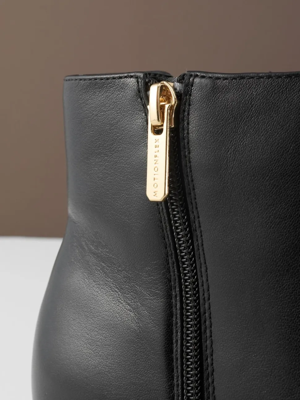 Black Leather Motion Flex Almond Toe Chelsea Style Ankle Boots