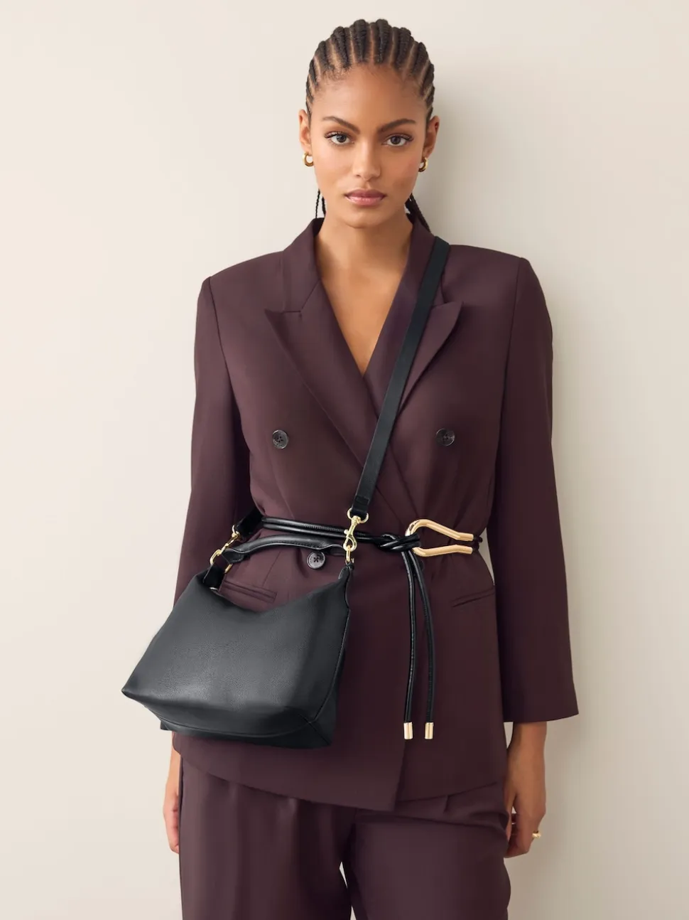 Black Leather Scooped Hand Held Bag