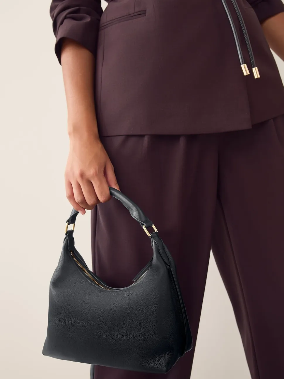 Black Leather Scooped Hand Held Bag