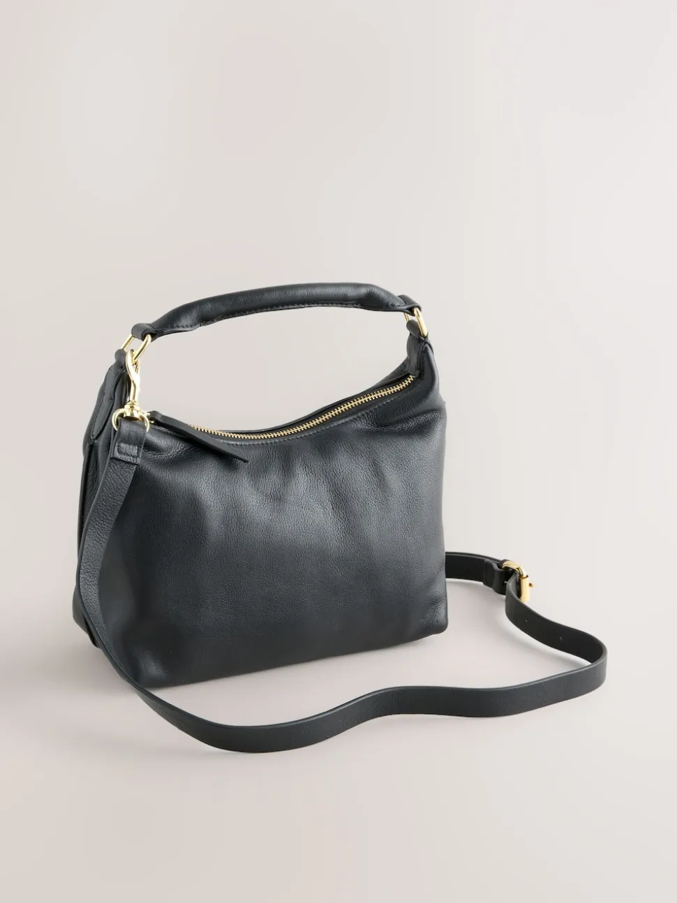 Black Leather Scooped Hand Held Bag
