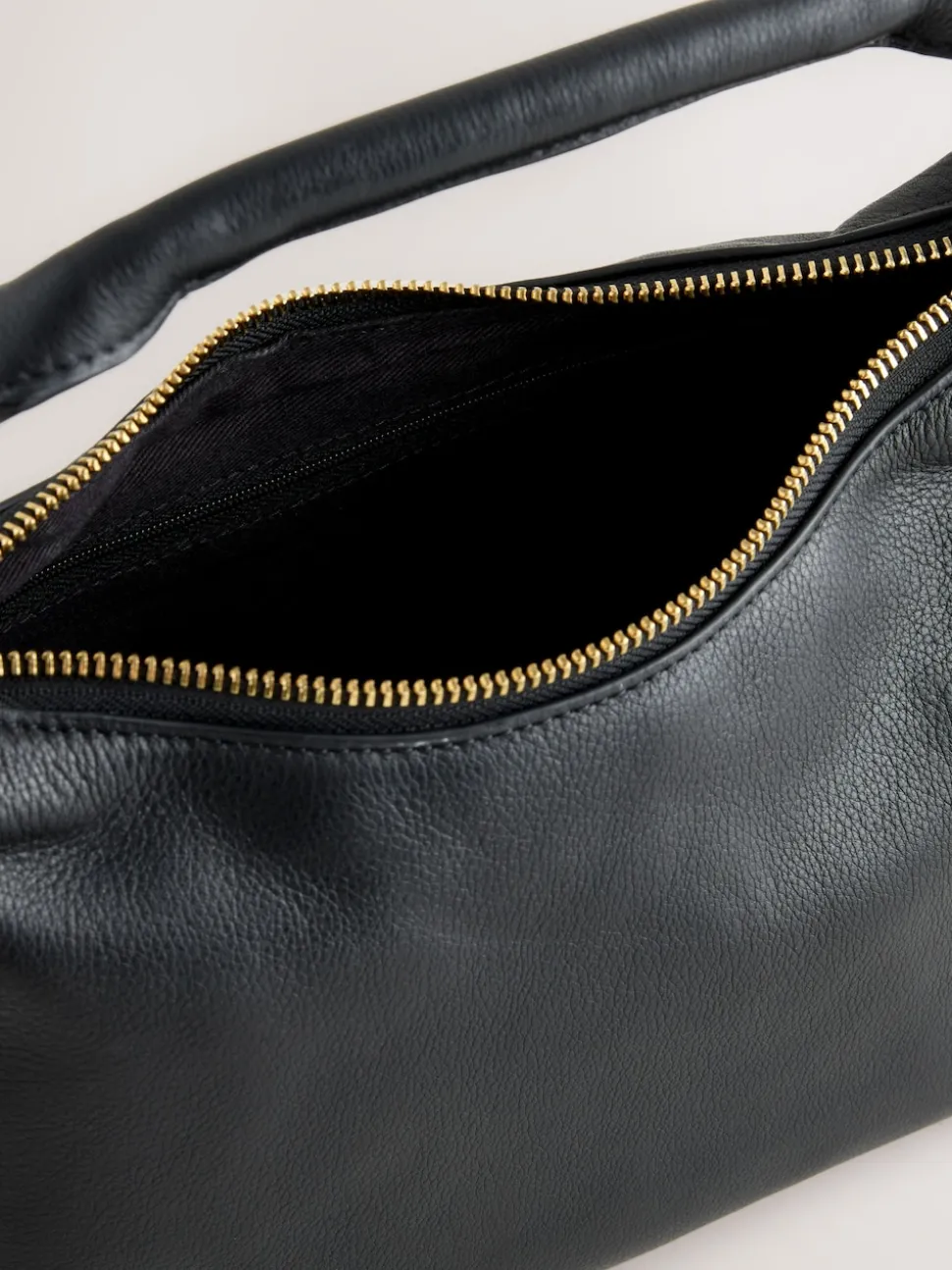 Black Leather Scooped Hand Held Bag