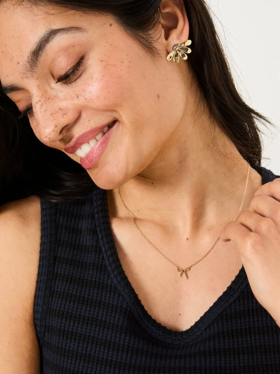 FatFace Gold Tone Bow Pendant Necklace