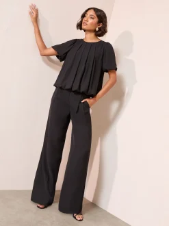 Friends Like These Black Short Sleeve Bubble Hem Pleated Blouse