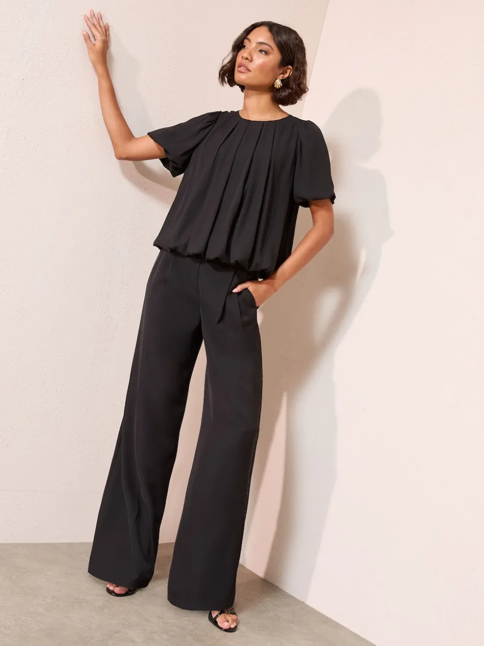 Friends Like These Black Short Sleeve Bubble Hem Pleated Blouse