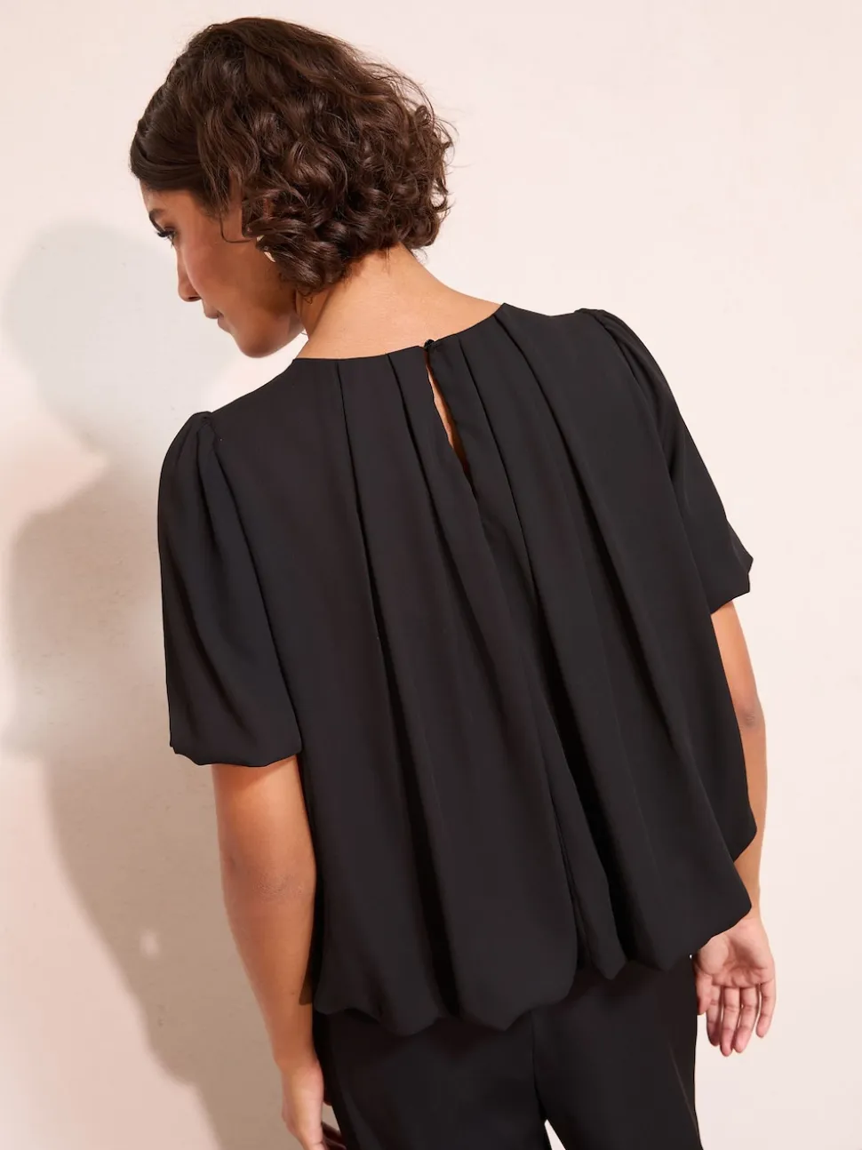 Friends Like These Black Short Sleeve Bubble Hem Pleated Blouse
