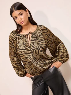 Friends Like These Gold Zebra Print Long Sleeve Bubble Hem Tie Neck Blouse