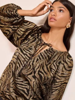 Friends Like These Gold Zebra Print Long Sleeve Bubble Hem Tie Neck Blouse