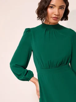 Friends Like These Green High Neck Long Sleeve Midi Dress with Bow Detailing