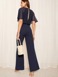 Friends Like These Navy Blue Petite Chiffon Flutter Sleeve Scuba Jumpsuit