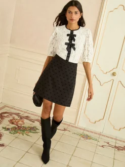 Love & Roses Black Flocked Bow Print Mini Skirt