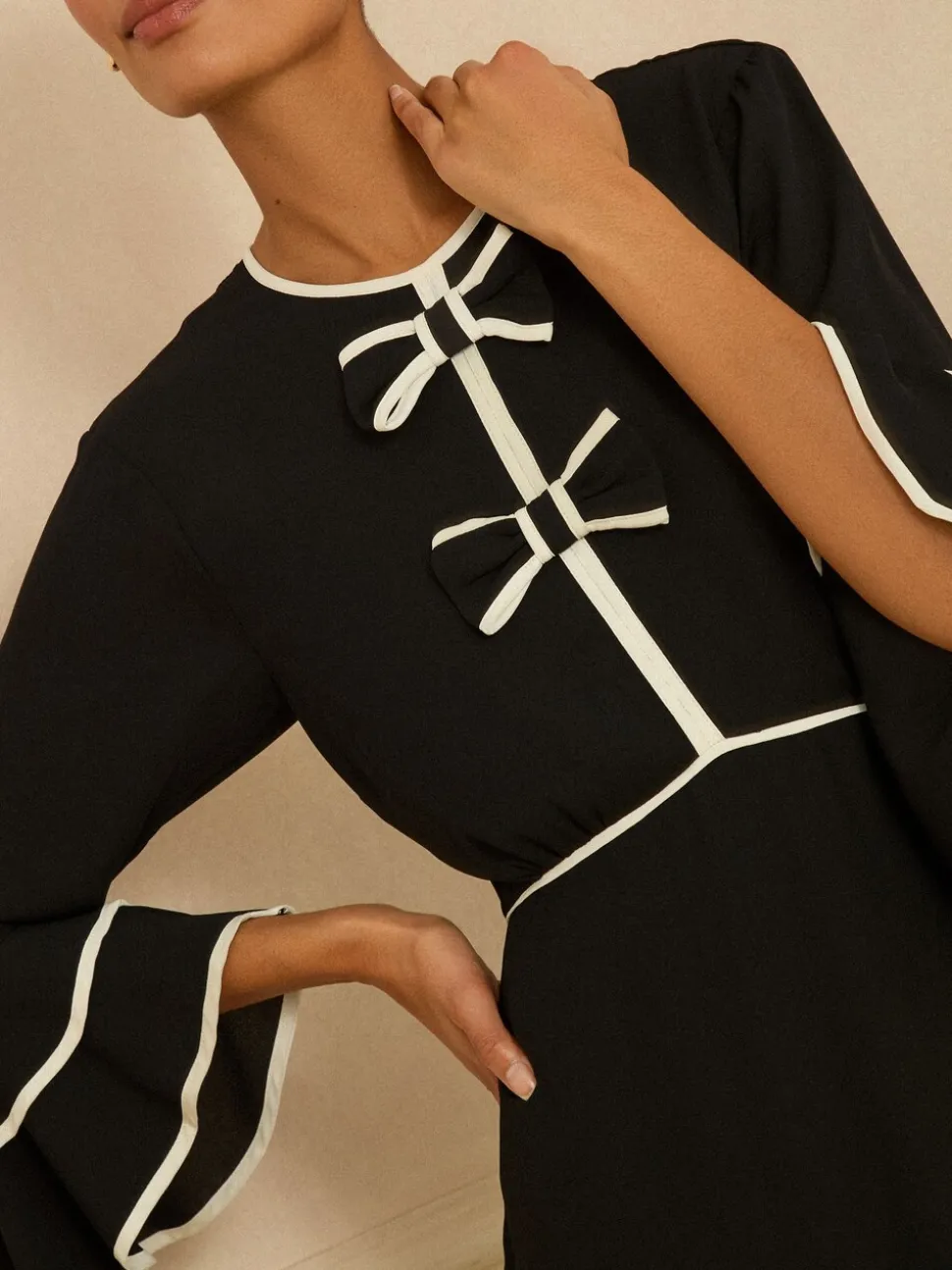 Love & Roses Bow Tipped Flute Sleeve Mini Dress