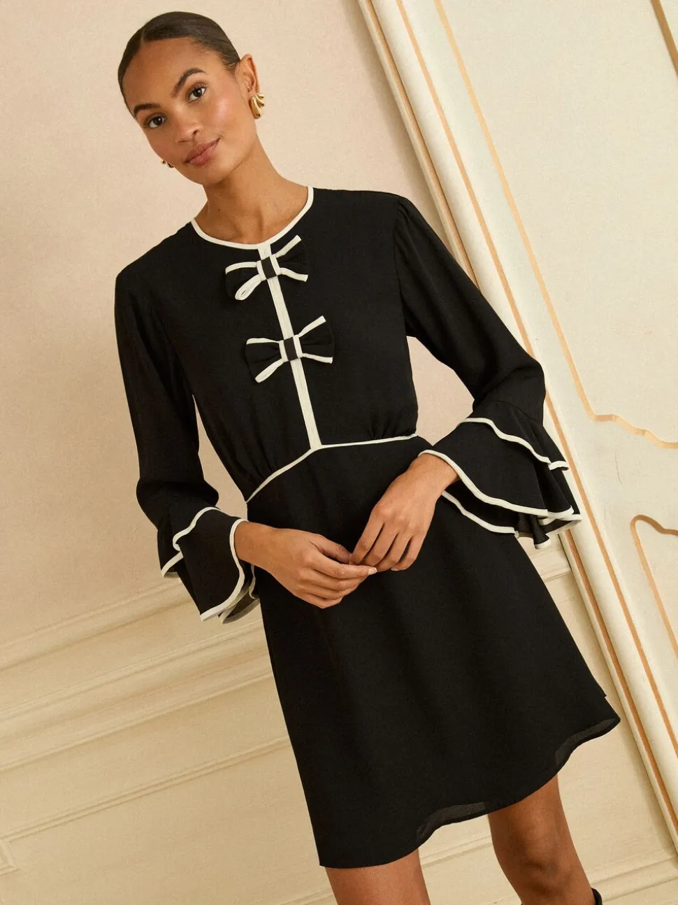 Love & Roses Bow Tipped Flute Sleeve Mini Dress