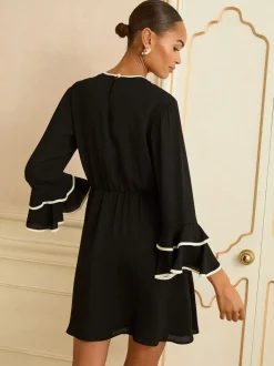 Love & Roses Bow Tipped Flute Sleeve Mini Dress