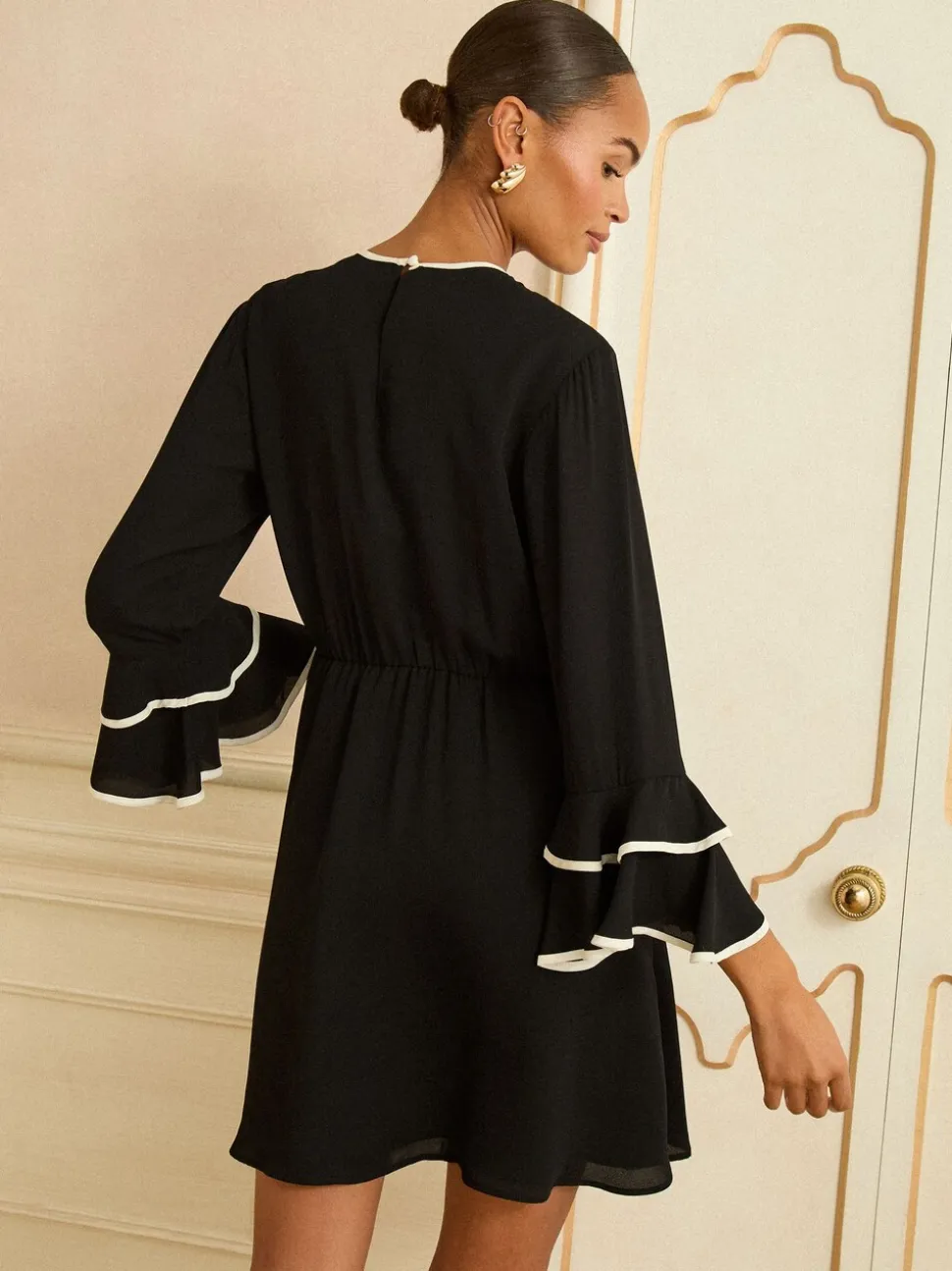 Love & Roses Bow Tipped Flute Sleeve Mini Dress