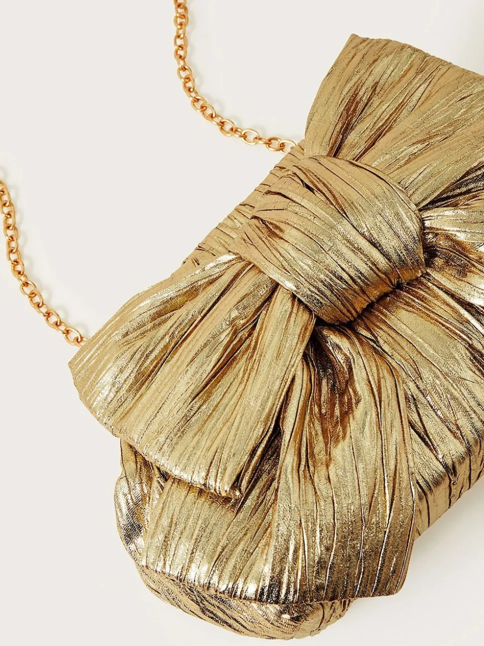 Monsoon Gold Tone Oversized Bow Metallic Bag