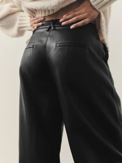 Nothing Ordinary Black Faux Leather Barrel Leg Trousers
