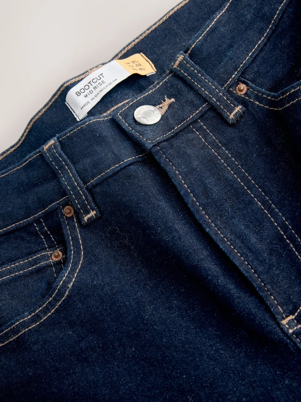 Rinse Blue Mid Rise Stretch Bootcut Jeans
