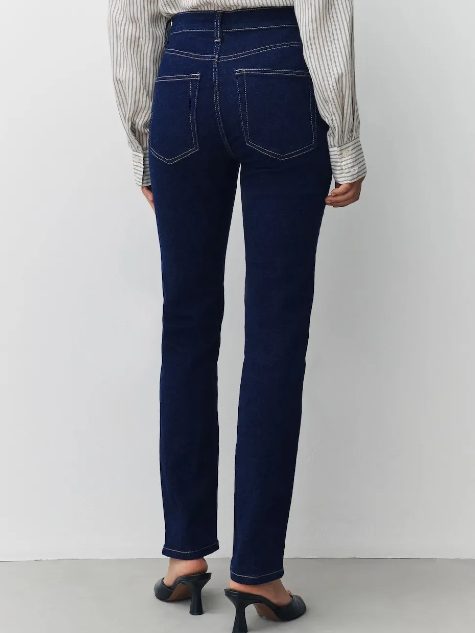 Rinse Blue Slim Mid Rise Stretch Jeans