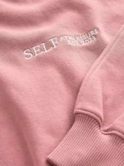 self. Pink Half Zip Sweatshirt