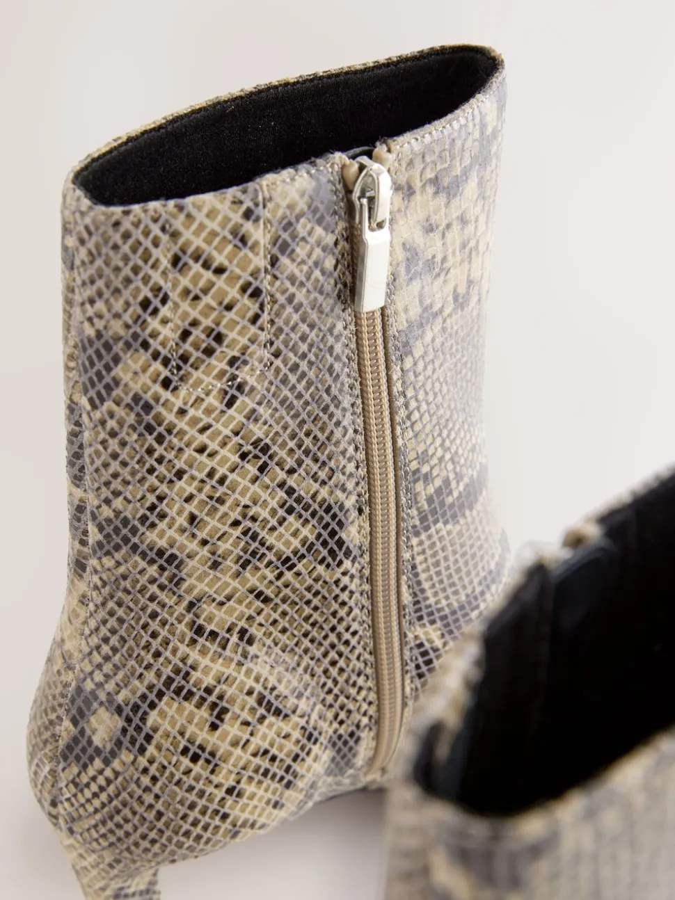 Snake Forever Comfort® Chisel Toe Heeled Ankle Boots