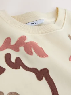 White Sweatshirt with Appliqué Details